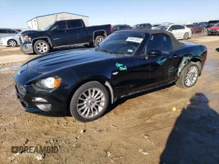 2019 FIAT 124 Spider Urbana Edition z VIN JC1NFAEK2K0143312, wystawiony jako Copart lot #88481665 z przebiegiem 55 159 mil mil oraz Szkoda całkowita • Salvage title. Historia ofert i sprzedaży dostępna na DreamBid. Obrazek 1.