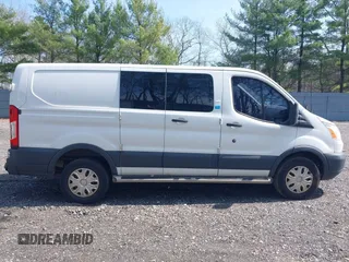 2015 Ford Transit Cargo with VIN 1FTNR1ZM9FKA56829, listed as a IAAI auction lot 42016014 with 261,768 mi miles. Bid and sale history available at carsss.com. Image 13.