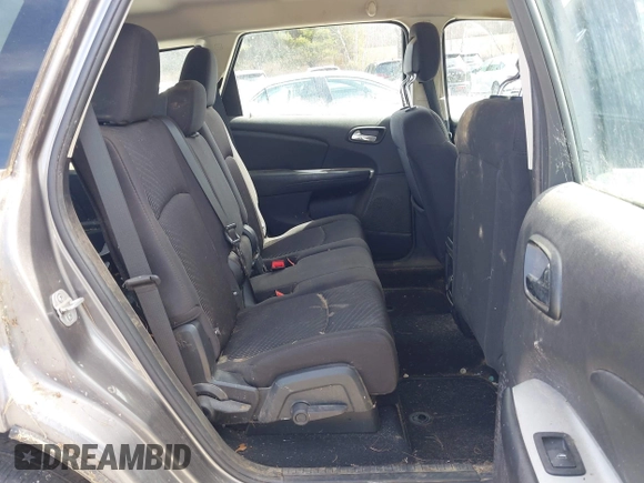 2013 Dodge Journey SE Plus with VIN 3C4PDCAB9DT582144, listed as a IAAI auction lot 41964828 with 171,398 mi miles and . Bid and sale history available at DreamBid. Image 8.
