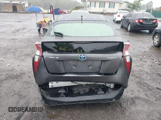 2016 Toyota Prius Two z VIN JTDKBRFU7G3000989, wystawiony jako IAAI lot #42345088 z przebiegiem 117 427 mil mil oraz . Historia ofert i sprzedaży dostępna na DreamBid. Obrazek 16.