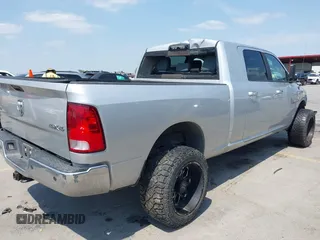 2015 Ram 2500 SLT with VIN 3C6UR5ML9FG611388, listed as a IAAI auction lot 42045503 with 164,547 mi miles and . Bid and sale history available at DreamBid. Image 4.