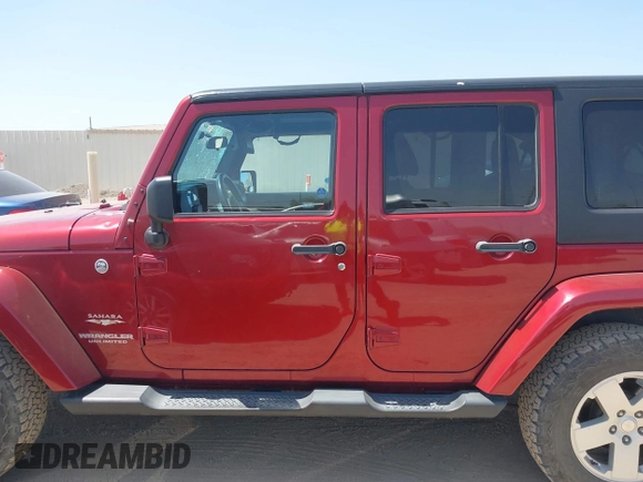 2012 Jeep Wrangler Unlimited Sahara with VIN 1C4BJWEG2CL209600, listed as a IAAI auction lot 42015290 with 133,229 mi miles and . Bid and sale history available at DreamBid. Image 14.