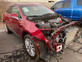 2019 Cadillac XT5 Premium Luxury AWD z VIN 1GYKNFRS2KZ251595, wystawiony jako Copart lot #52217765 z przebiegiem 23 925 mil mil oraz Szkoda całkowita • Salvage title. Historia ofert i sprzedaży dostępna na DreamBid. Obrazek 1.