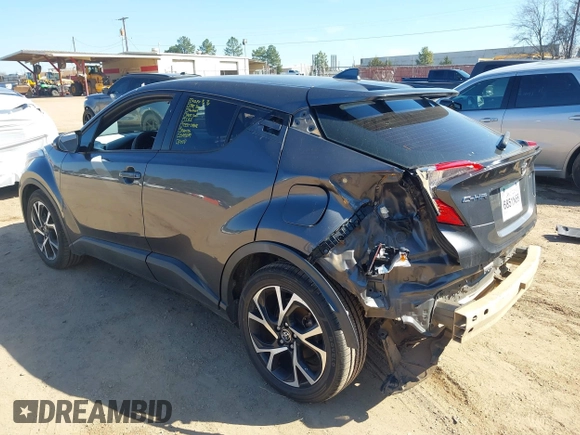2018 Toyota C-HR XLE with VIN NMTKHMBXXJR021230, listed as a IAAI auction lot 41684693 with 157,438 mi miles and . Bid and sale history available at DreamBid. Image 3.