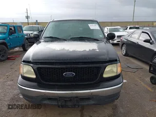 2003 Ford F-150 XLT with VIN 1FTRW07623KD67409, listed as a IAAI auction lot 41912067 with Not Provided miles. Bid and sale history available at carsss.com. Image 12.