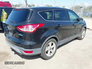 2015 Ford Escape SE with VIN 1FMCU0G91FUA18588, listed as a IAAI auction lot 41958047 with 111,523 mi miles. Bid and sale history available at carsss.com. Image 4.