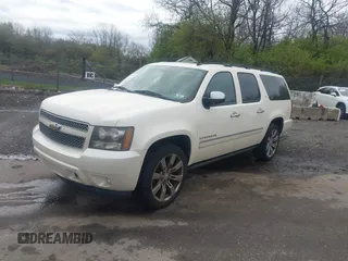 2010 Chevrolet Suburban LTZ with VIN 1GNUKKE35AR129351, listed as a IAAI auction lot 41971625 with 234,487 mi miles. Bid and sale history available at carsss.com. Image 2.