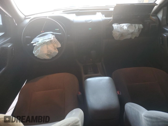 2000 Jeep Grand Cherokee Laredo with VIN 1J4GW48S0YC253091, listed as a Copart auction lot 60357255 with 218,410 mi miles and Clean title. Bid and sale history available at DreamBid. Image 8.