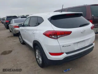 2016 Hyundai Tucson SE with VIN KM8J23A4XGU238521, listed as a IAAI auction lot 41886259 with 126,974 mi miles. Bid and sale history available at carsss.com. Image 3.