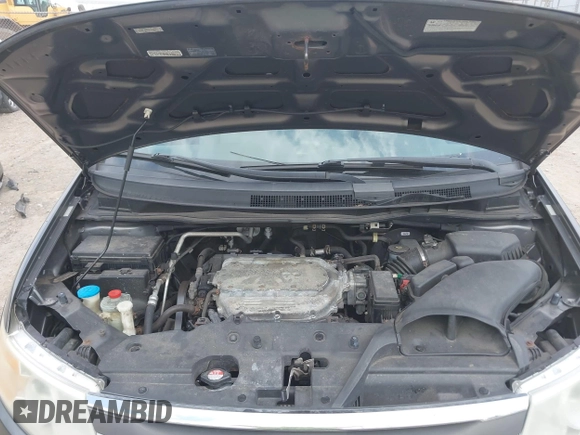 2012 Honda Odyssey Touring with VIN 5FNRL5H90CB045430, listed as a IAAI auction lot 42079770 with 113,901 mi miles and . Bid and sale history available at DreamBid. Image 10.
