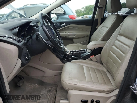 2015 Ford Escape Titanium with VIN 1FMCU9J96FUB32972, listed as a Copart auction lot 62886145 with 215,769 mi miles and Salvage title. Bid and sale history available at DreamBid. Image 7.