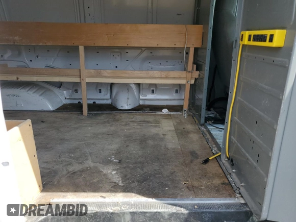 2014 Ford Econoline Cargo Commercial with VIN 1FTNE2EW3EDA33705, listed as a Copart auction lot 60919935 with 174,371 mi miles and Salvage title. Bid and sale history available at DreamBid. Image 11.