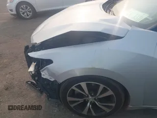 2018 Nissan Maxima SV z VIN 1N4AA6AP1JC366927, wystawiony jako IAAI lot #42394242 z przebiegiem 89 093 mil mil oraz . Historia ofert i sprzedaży dostępna na DreamBid. Obrazek 19.