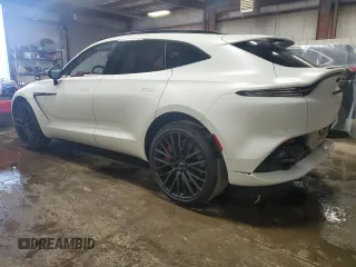2023 Aston Martin DBX z VIN SD7VUJAW3PTV08474, wystawiony jako Copart lot #66961574 z przebiegiem 3449 mil mil oraz Szkody całkowita. Historia ofert i sprzedaży dostępna na DreamBid. Obrazek 2.
