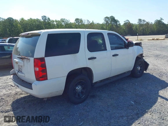 2011 Chevrolet Tahoe Commercial with VIN 1GNLC2E04BR293125, listed as a IAAI auction lot 42476037 with 123,666 mi miles and . Bid and sale history available at DreamBid. Image 4.