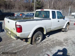 2001 Ford Ranger XL with VIN 1FTYR14U61TA98561, listed as a IAAI auction lot 41614061 with 180,434 mi miles. Bid and sale history available at carsss.com. Image 4.