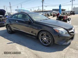 2015 Mercedes-Benz E 400 with VIN WDDKJ6FB1FF300725, listed as a Copart auction lot 63770125 with 41,009 mi miles and Salvage title. Bid and sale history available at DreamBid. Image 4.