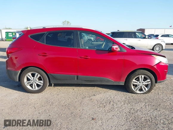 2013 Hyundai Tucson GLS with VIN KM8JU3AC6DU763590, listed as a IAAI auction lot 41999555 with 149,960 mi miles. Bid and sale history available at carsss.com. Image 13.