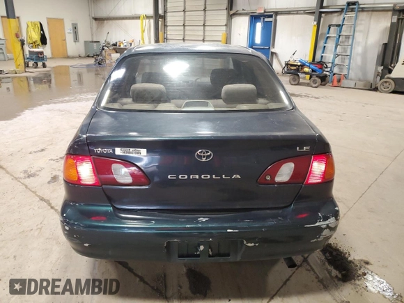 1999 Toyota Corolla VE with VIN 2T1BR12E2XC136739, listed as a Copart auction lot 60693625 with 170,989 mi miles and Salvage title. Bid and sale history available at DreamBid. Image 6.
