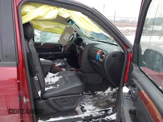 2006 GMC Envoy Denali with VIN 1GKET63M162337213, listed as a IAAI auction lot 41292801 with 133,201 mi miles. Bid and sale history available at carsss.com. Image 5.