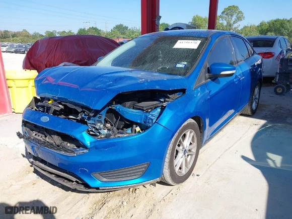 2015 Ford Focus SE with VIN 1FADP3F21FL287269, listed as a IAAI auction lot 41791570 with 122,802 mi miles. Bid and sale history available at carsss.com. Image 2.