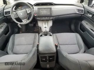 2018 Honda Clarity with VIN JHMZC5F14JC017054, listed as a Copart auction lot 65295514 with 74,498 mi miles and Salvage title. Bid and sale history available at DreamBid. Image 8.