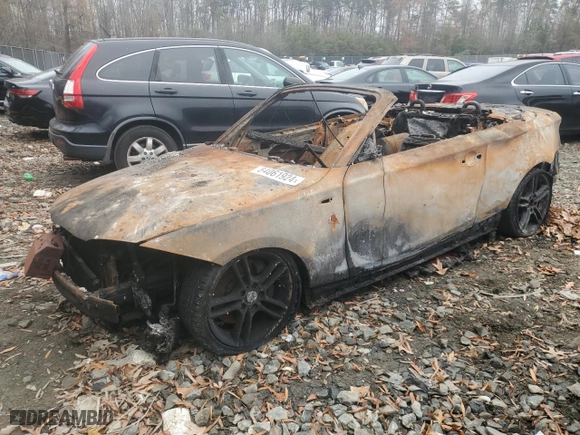 2011 BMW 1 Series 135i with VIN WBAUN7C52BVM23944, listed as a Copart auction lot 84061924 with 0 mi miles and Salvage Title. Bid and sale history available at carsss.com. Image 1.