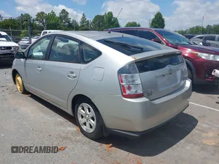2005 Toyota Prius z VIN JTDKB20UX57051568, wystawiony jako IAAI lot #42318318 z przebiegiem 138 487 mil mil oraz . Historia ofert i sprzedaży dostępna na DreamBid. Obrazek 3.