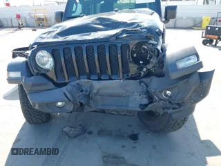 2020 Jeep Wrangler Unlimited Freedom with VIN 1C4HJXDG0LW238819, listed as a IAAI auction lot 42139357 with 67,619 mi miles and . Bid and sale history available at DreamBid. Image 12.
