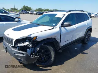 2021 Jeep Cherokee Trailhawk with VIN 1C4PJMBX1MD145169, listed as a IAAI auction lot 42340464 with 50,925 mi miles and . Bid and sale history available at DreamBid. Image 2.