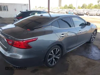 2018 Nissan Maxima SL with VIN 1N4AA6AP7JC398359, listed as a IAAI auction lot 42237007 with 70,010 mi miles and . Bid and sale history available at DreamBid. Image 4.