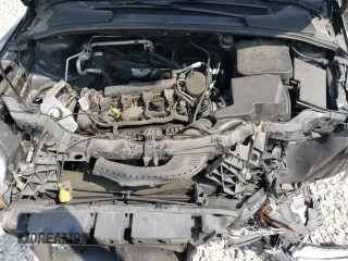 2013 Ford Focus SE z VIN 1FADP3F20DL330366, wystawiony jako Copart lot #59204595 z przebiegiem 163 305 mil mil oraz Szkoda całkowita • Salvage title. Historia ofert i sprzedaży dostępna na DreamBid. Obrazek 11.