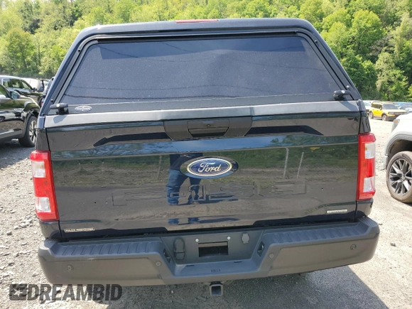 2023 Ford F-150 with VIN 1FTFW1P83PKE89261, listed as a Copart auction lot 56625325 with 9,079 mi miles and Salvage title. Bid and sale history available at DreamBid. Image 6.