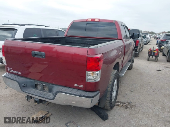 2010 Toyota Tundra 4WD Truck with VIN 5TFUM5F1XAX007758, listed as a IAAI auction lot 41545602 with 441,934 mi miles. Bid and sale history available at carsss.com. Image 4.