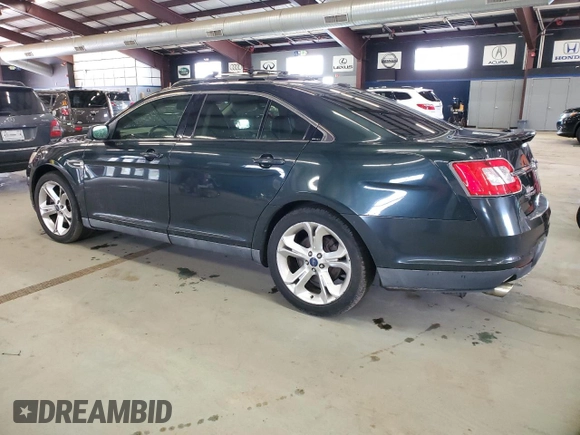 2010 Ford Taurus SHO with VIN 1FAHP2KT0AG137908, listed as a Copart auction lot 53032905 with 214,574 mi miles and Clean title. Bid and sale history available at DreamBid. Image 2.