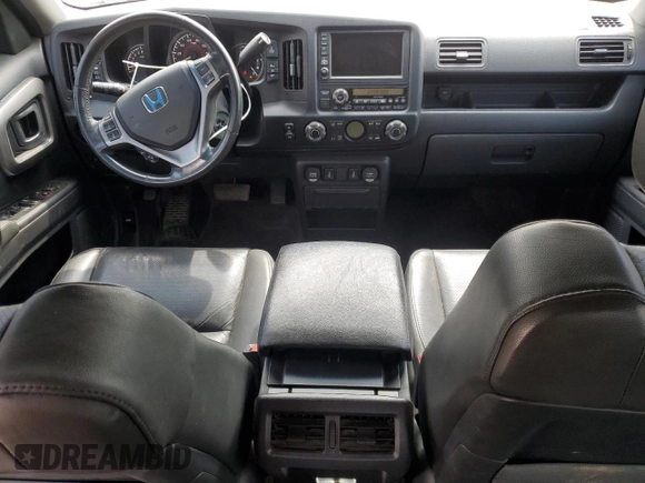 2010 Honda Ridgeline RTL with VIN 5FPYK1F5XAB014004, listed as a Copart auction lot 62848595 with 131,920 mi miles and Clean title. Bid and sale history available at DreamBid. Image 8.