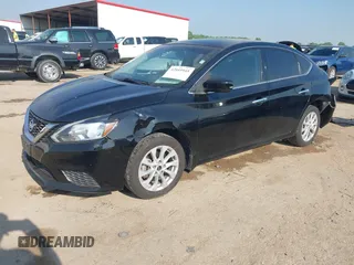 2019 Nissan Sentra S z VIN 3N1AB7AP3KY218433, wystawiony jako IAAI lot #42049945 z przebiegiem 108 874 mil mil oraz . Historia ofert i sprzedaży dostępna na DreamBid. Obrazek 2.