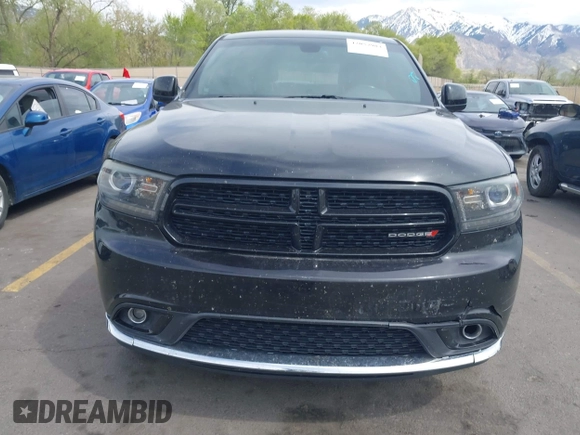 2015 Dodge Durango SXT with VIN 1C4RDJAGXFC796034, listed as a IAAI auction lot 42057983 with 159,108 mi miles and . Bid and sale history available at DreamBid. Image 12.