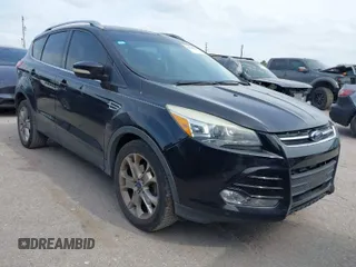 2014 Ford Escape Titanium with VIN 1FMCU0JX5EUB43194, listed as a IAAI auction lot 42084883 with 71,819 mi miles. Bid and sale history available at carsss.com. Image 1.