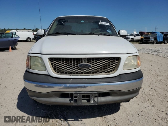 2002 Ford F-150 XL with VIN 1FTRX17W82NA64876, listed as a Copart auction lot 50013045 with 256,345 mi miles and Salvage Title. Bid and sale history available at carsss.com. Image 5.