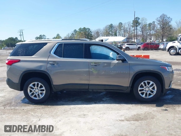 2018 Chevrolet Traverse LT Cloth z VIN 1GNEVGKW4JJ281837, wystawiony jako IAAI lot #41919081 z przebiegiem 91 496 mil mil oraz . Historia ofert i sprzedaży dostępna na DreamBid. Obrazek 13.