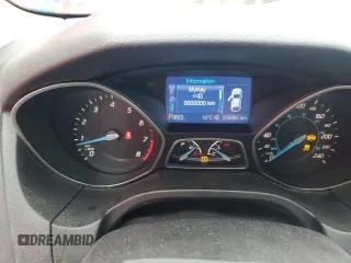 2013 Ford Focus SE z VIN 1FADP3F21DL310739, wystawiony jako Copart lot #57679325 z przebiegiem 225 860 mil mil oraz Czysty tytuł • Clean title. Historia ofert i sprzedaży dostępna na DreamBid. Obrazek 9.