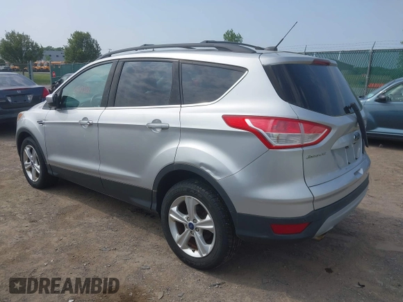 2014 Ford Escape SE z VIN 1FMCU9GX3EUB83978, wystawiony jako IAAI lot #42509549 z przebiegiem 121 388 mil mil oraz . Historia ofert i sprzedaży dostępna na DreamBid. Obrazek 3.