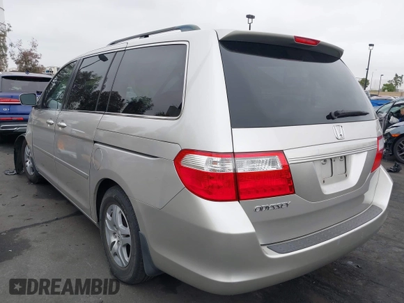 2007 Honda Odyssey EX-L with VIN 5FNRL38687B423865, listed as a IAAI auction lot 42190749 with 215,664 mi miles and . Bid and sale history available at DreamBid. Image 3.
