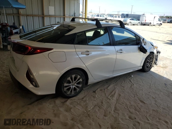 2021 Toyota Prius LE с VIN JTDKAMFP5M3186379, выставлен на аукционе Copart как лот 58527115 с пробегом 93 203 миль миль и Списание • Salvage title. История ставок и продаж доступна на DreamBid. Изображение 3.