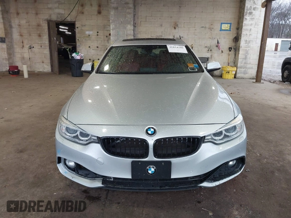 2016 BMW 4 Series 428i xDrive with VIN WBA4C9C56GG139973, listed as a IAAI auction lot 41834506 with 94,587 mi miles and . Bid and sale history available at DreamBid. Image 12.