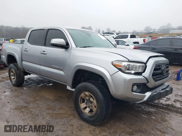 2018 Toyota Tacoma SR with VIN 3TMCZ5AN4JM148581, listed as a IAAI auction lot 41462945 with 115,655 mi miles. Bid and sale history available at carsss.com. Image 1.