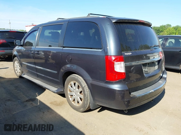 2014 Chrysler Town & Country Touring with VIN 2C4RC1BG2ER124461, listed as a IAAI auction lot 42181413 with 181,360 mi miles and . Bid and sale history available at DreamBid. Image 3.