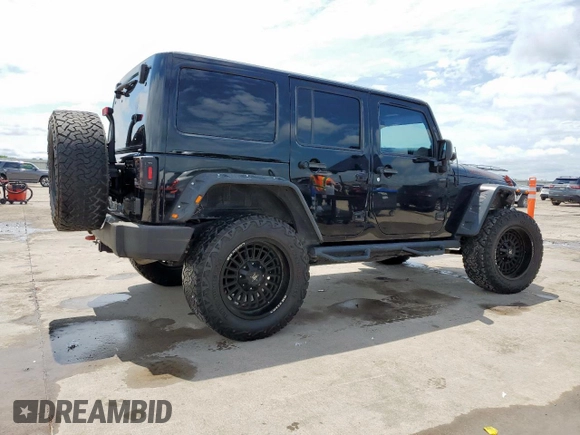 2014 Jeep Wrangler Unlimited Rubicon с VIN 1C4HJWFG1EL156853, выставлен на аукционе Copart как лот 58496795 с пробегом 112 073 миль миль и Списание • Salvage title. История ставок и продаж доступна на DreamBid. Изображение 3.