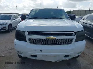 2011 Chevrolet Suburban LT with VIN 1GNSCJE09BR150452, listed as a IAAI auction lot 42655961 with 208,311 mi miles and . Bid and sale history available at DreamBid. Image 12.